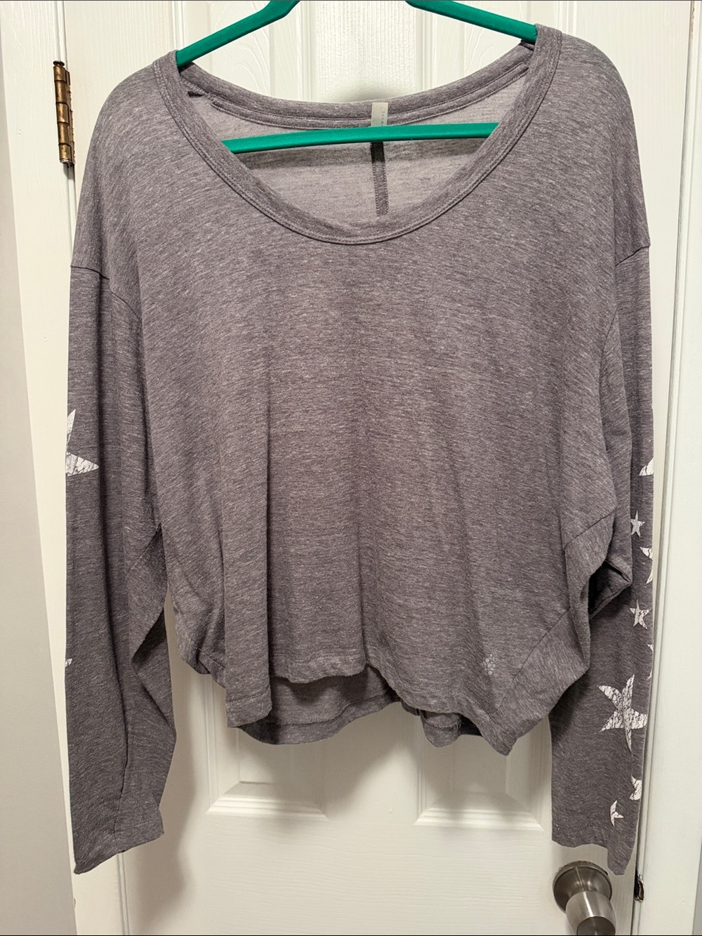 Free people, size medium, but will fit a large top V neck
